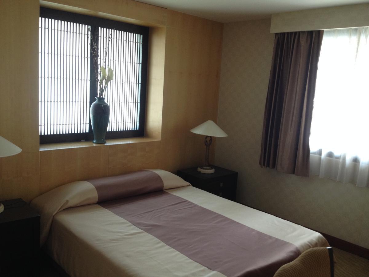 Gardengrove Suites Bangkok Room photo
